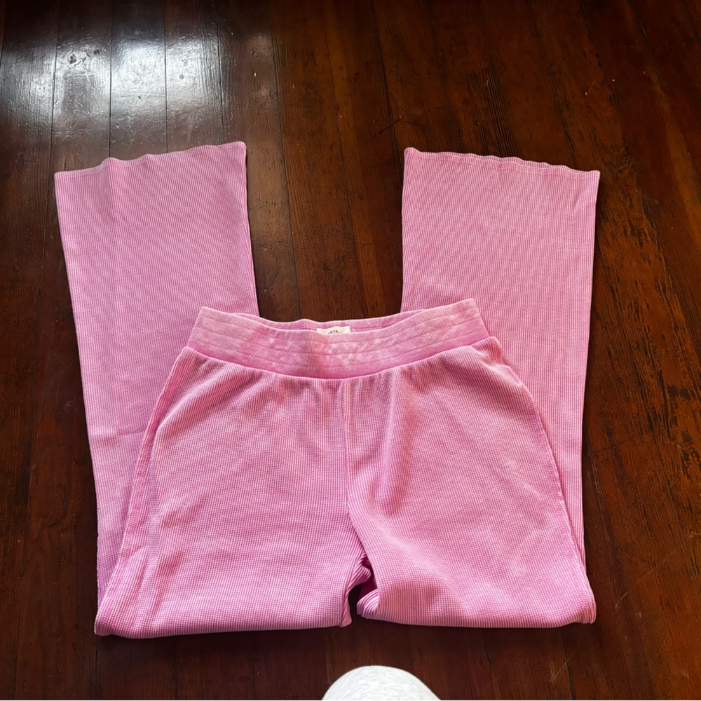 Smoke free,never worn. Flattering Cute pink flare pants.Size small. $25 obo